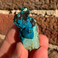 Chrysocolla after Calcite on Quartz