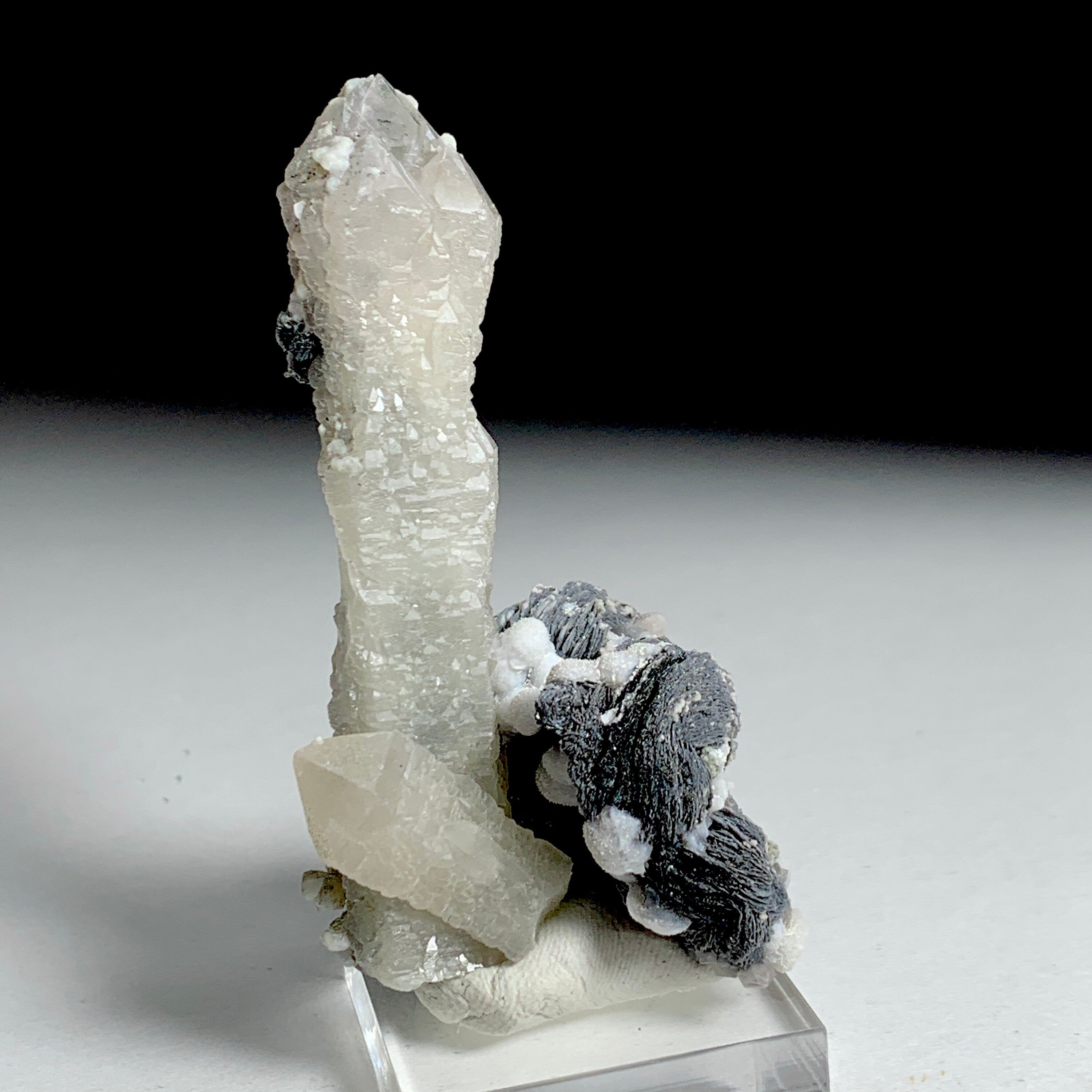 Quartz with Hematite Rosettes | China