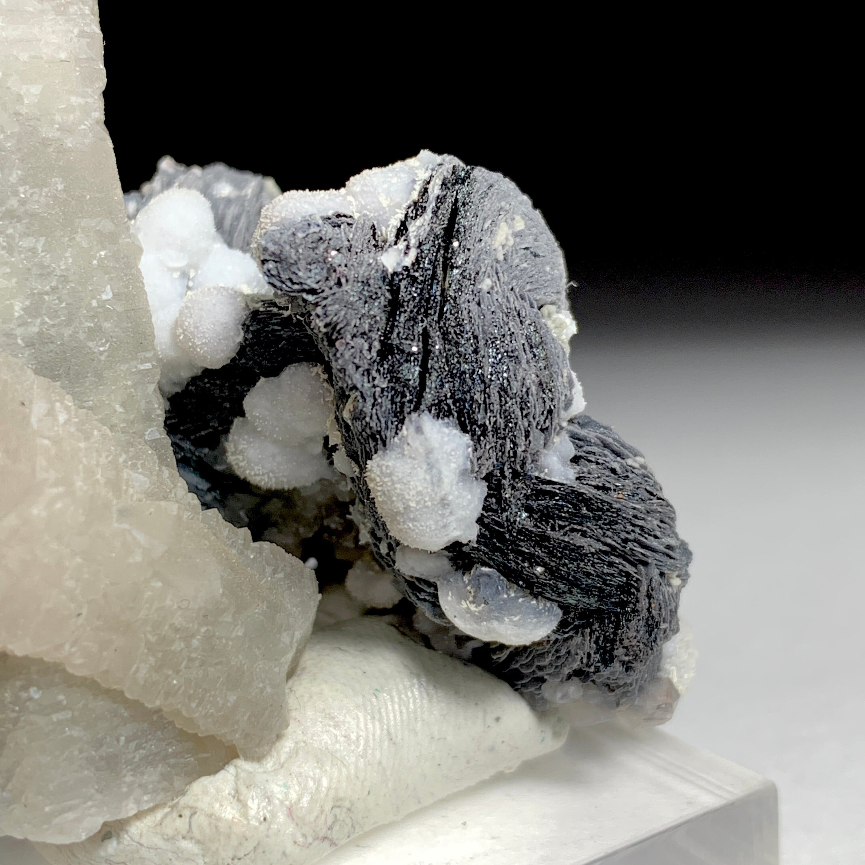 Quartz with Hematite Rosettes | China