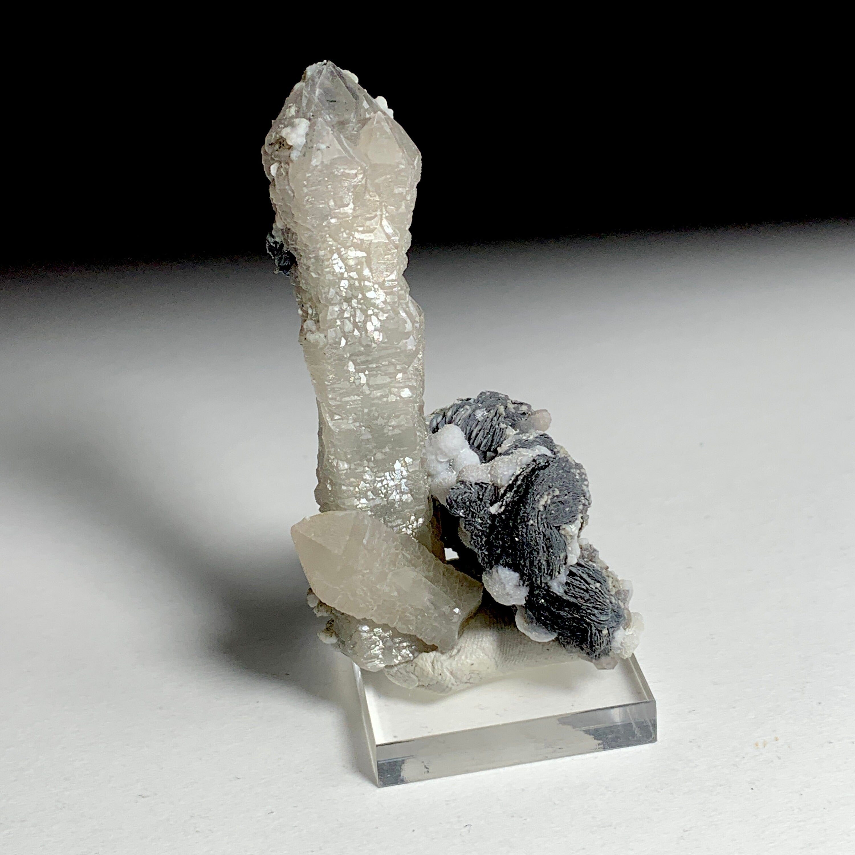 Quartz with Hematite Rosettes | China