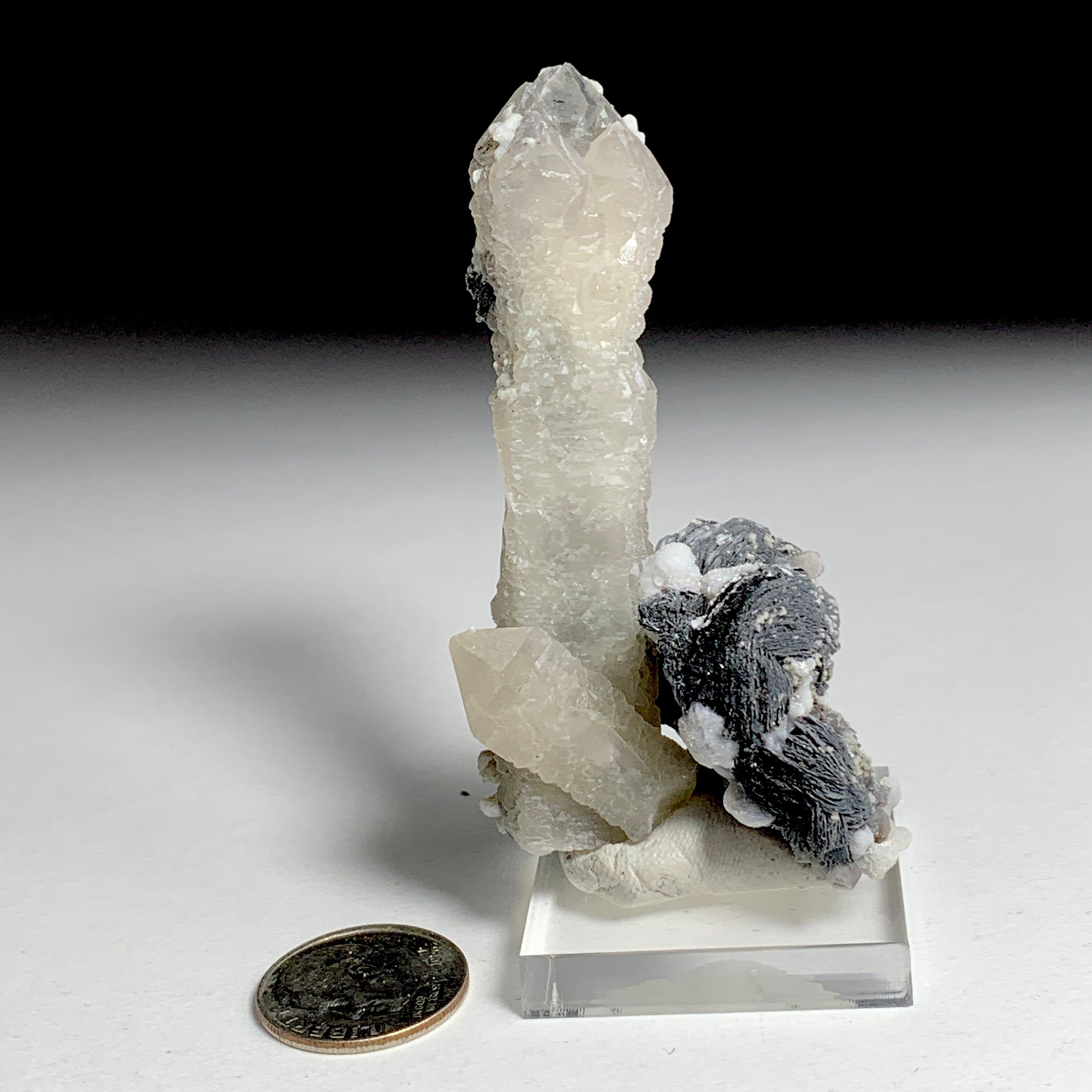 Quartz with Hematite Rosettes | China